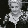 Charlotte Granville as Mrs. Crane
