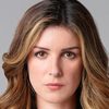 Shenae Grimes-Beech as Riley Vance