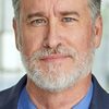 Mark Allyn as John Baker