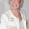 Joan Lee as Self (archive footage)