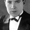 Lloyd Hughes as Edward E. Malone
