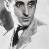 Leon Belasco as Waiter (uncredited)