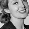 Michele Montau as Monique Ouidel