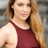 Taylor Tunes as Emily