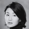 Maggie Cheung as Miss Ho
