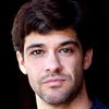 Travis Laughlin as Sam