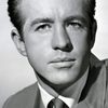 Clu Gulager as Lt. Ed Flynn (archive footage)