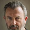 Nigel O'Neill as Mr. Deben