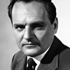 Robert Osterloh as Coroner