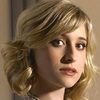 Allison Mack as Sarah Bartilson