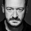 John Paul Hurley as John Thacker Sexton