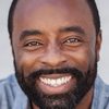 Jevon White as Robber 1