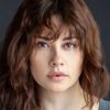 Chloe Van Landschoot as Nicole Kessinger
