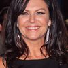 Wendy Crewson as Talk Show Hostess
