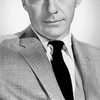 David Wayne as archive footage
