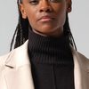 Letitia Wright as Aisha Osagie