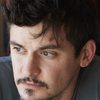James Cade as Chris