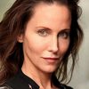 Nina Young as American Businesswoman