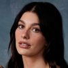 Camila Morrone as Mickey Peck