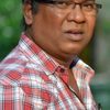 Kishore Kadam as College Football Coach