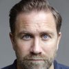 Phill Langhorne as Uniformed Policeman