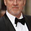 Alan Dale as Father John