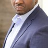 Tarnue Massaquoi as Sykes