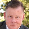 Joel Murray as Wilson