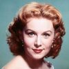 Rhonda Fleming as Joan Carlisle