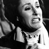 Margot Hartman as Mrs. Adams
