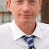 Ben Livingston as Minister