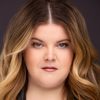 Ryann Redmond as Ellie