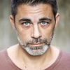 Marco Giuliani as Adriano