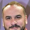 François-Xavier Demaison as Dinaro