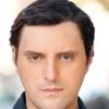 Roland Max as John