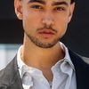 Archie Madekwe as Simon