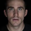Dan Aid as Theo