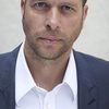 John Schwab as Interpol Agent #1