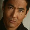 John Koyama as Tran