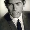 James Coburn as Mike Donan / Lou Donan