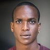 Emmanuel Okoye as Young Neighbour