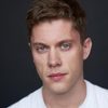 Charlie Maher as Aleks
