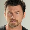 William Mark McCullough as Commander Dennis Dunphy