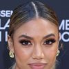 Paige Hurd as Gina Brown