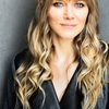 Brenda Schmid as Tracy Johnston