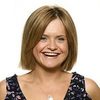 Emma Fitzgerald as Radio Broadcaster