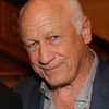 Joey Travolta as News Reporter