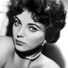 Joan Collins as Nera
