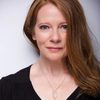 Leigh Ann Taylor as Radio Voice / Stock Market Expert