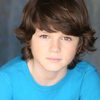 Zachary Hernandez as W.E.